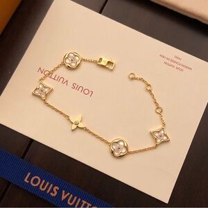 Louis Vuitton Gold and White Flower Motif Bracelet